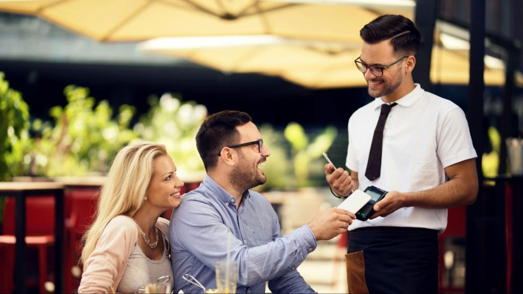 A man being kind to a server