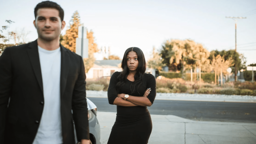 A woman looking upset at her husband