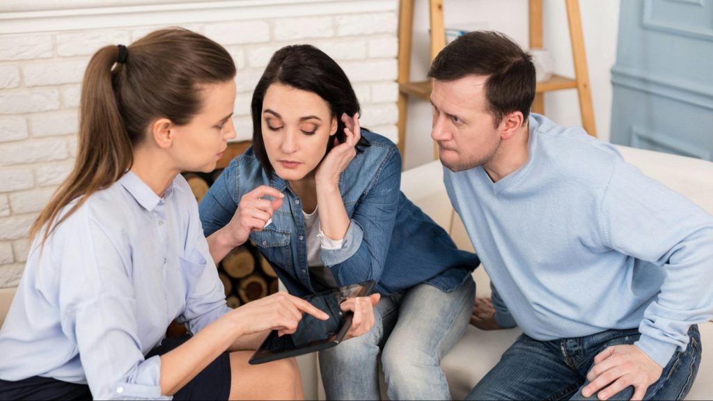 A woman telling story to her colleagues