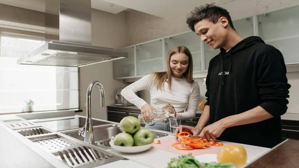 A couple cooking together