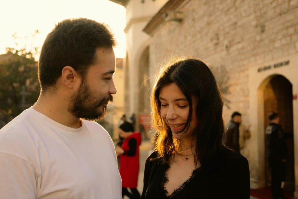 A woman telling a man what she wants