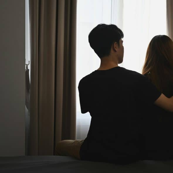 couple comforting each other