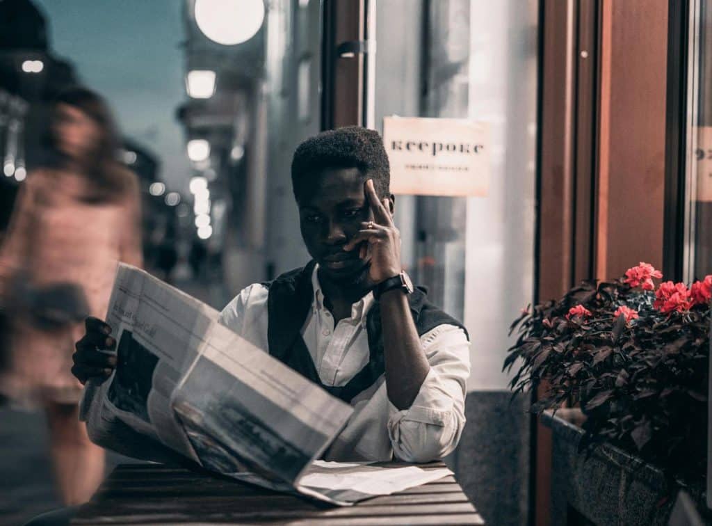 A man reading a newspaper