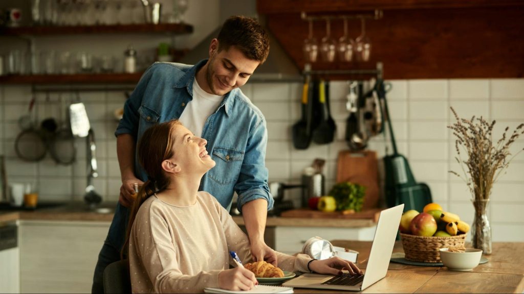 A man supporting a woman