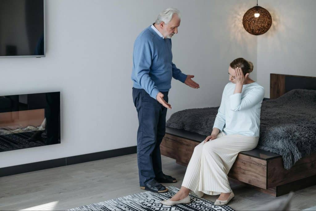 A man and woman having an awkward moment
