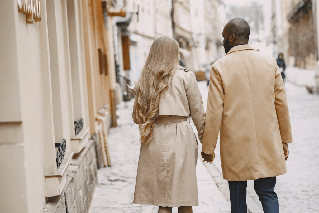 Outdoor couple walking down the street