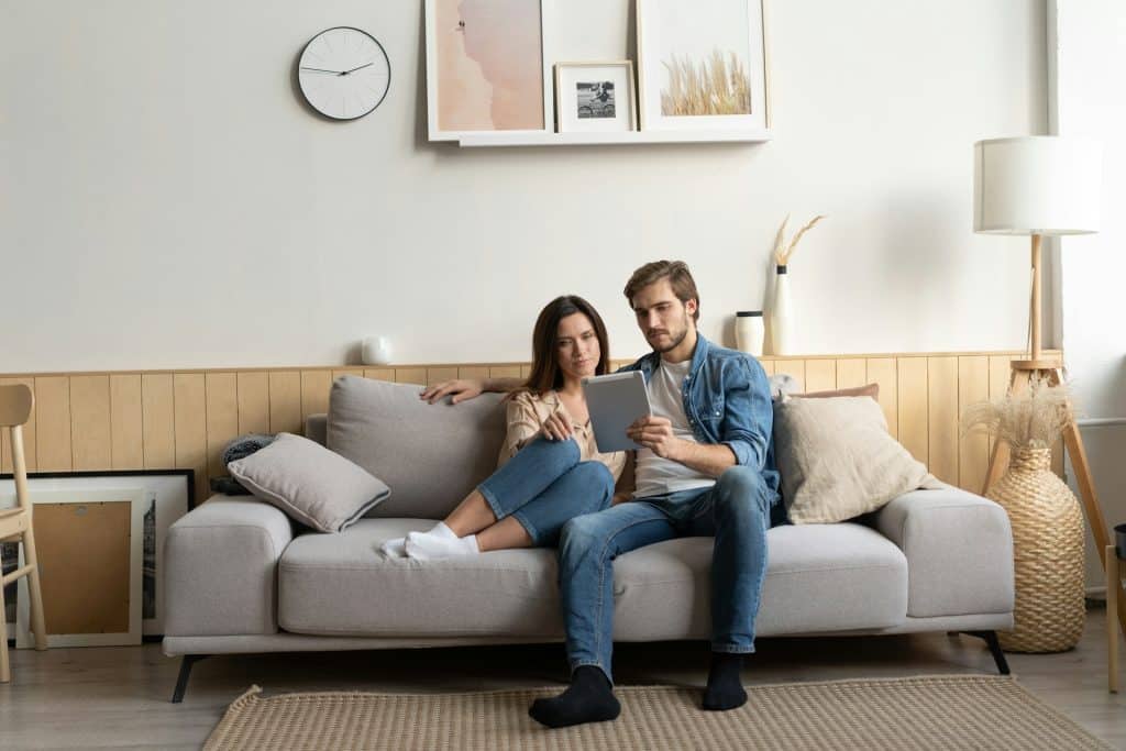couple sitting together on a couch