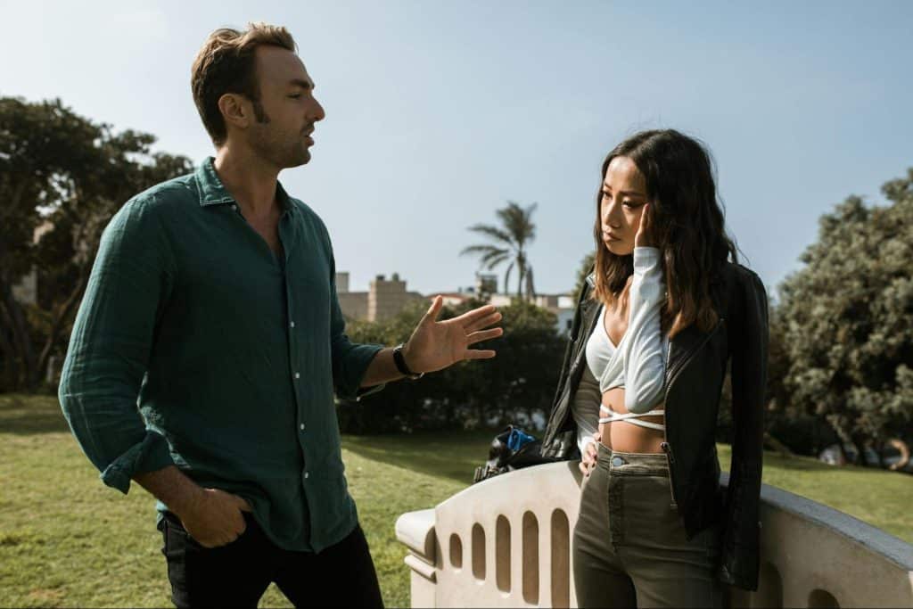 A man talking to woman