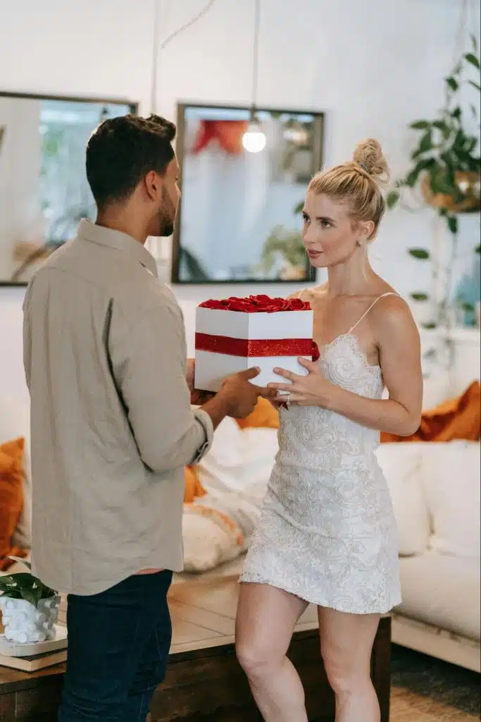 A man giving a gift to woman
