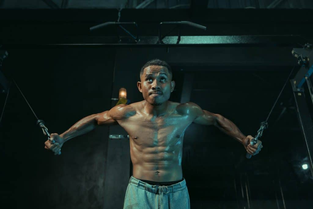 Alt text: man intense gym workout