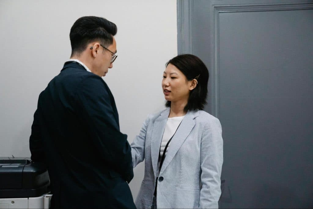 A man and woman talking calmly