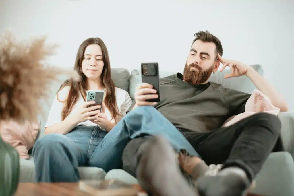 couple phones couch