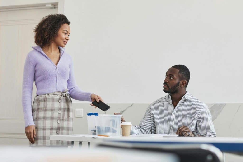 Woman smiling at the man