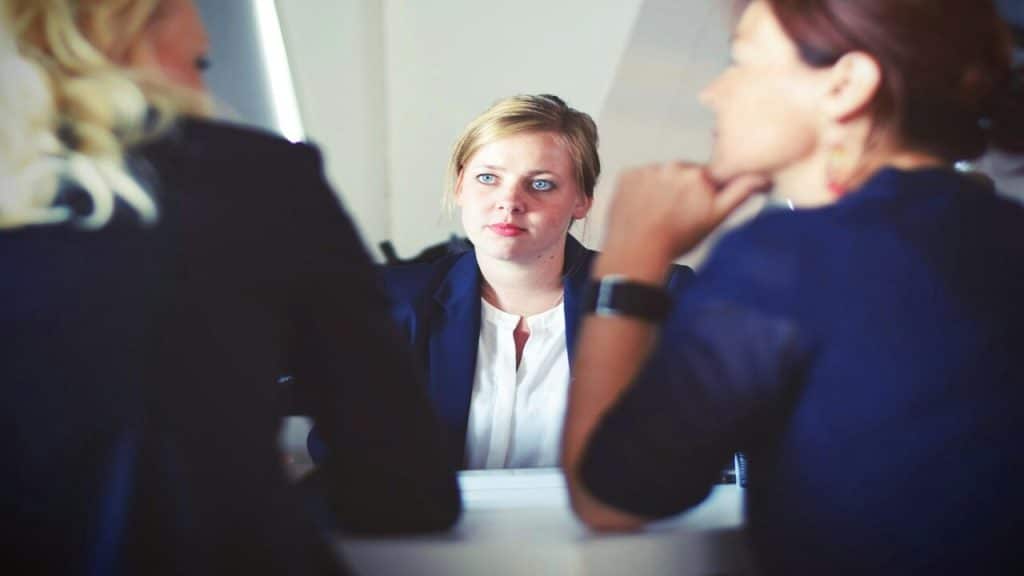 Three colleagues at a conference room