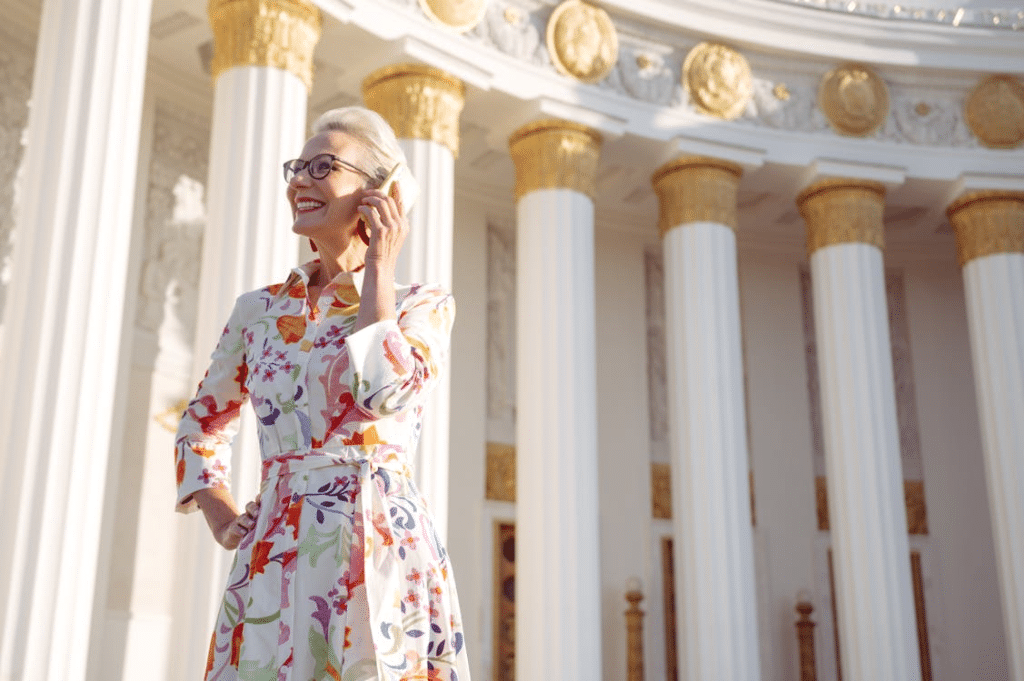 Happy confident mature woman on phone