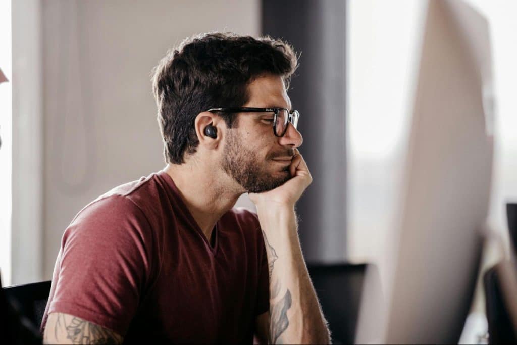 A man alone and listening to music