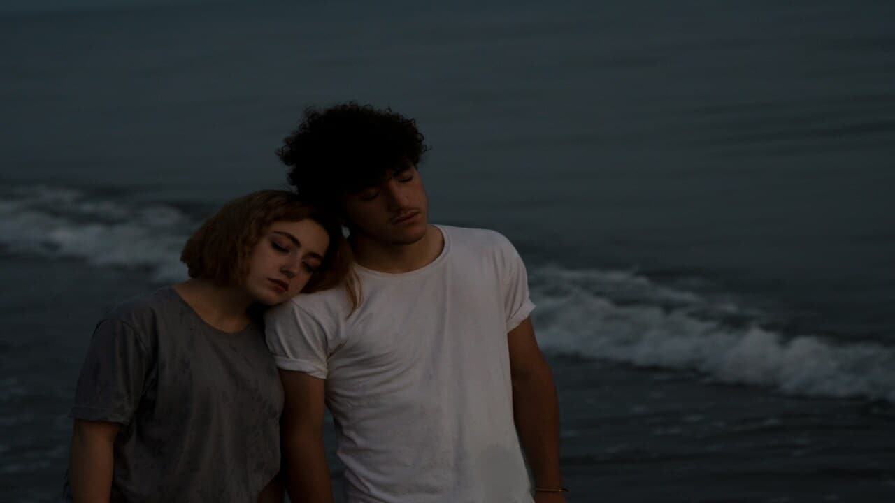 A sad couple by the beach