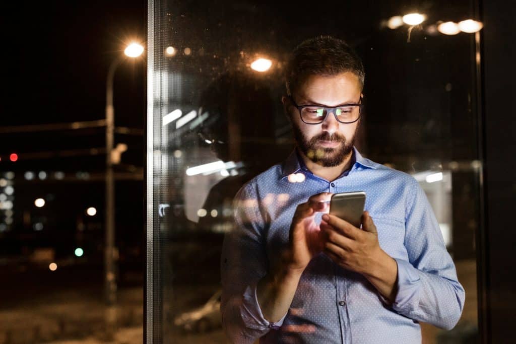 man texting