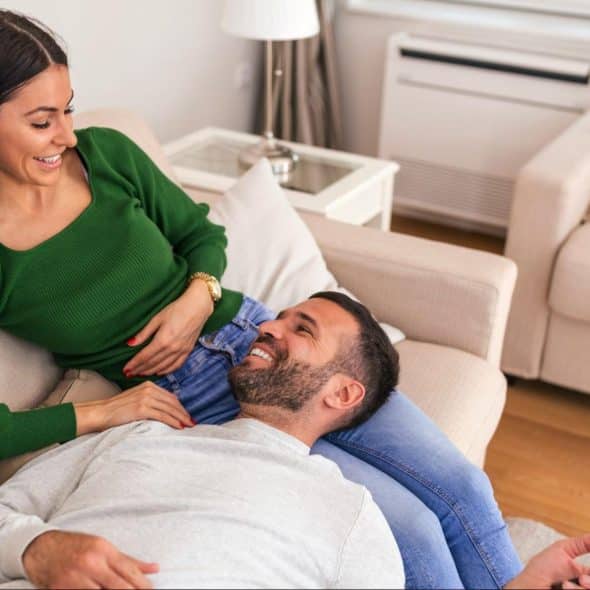 A man and a woman on the sofa