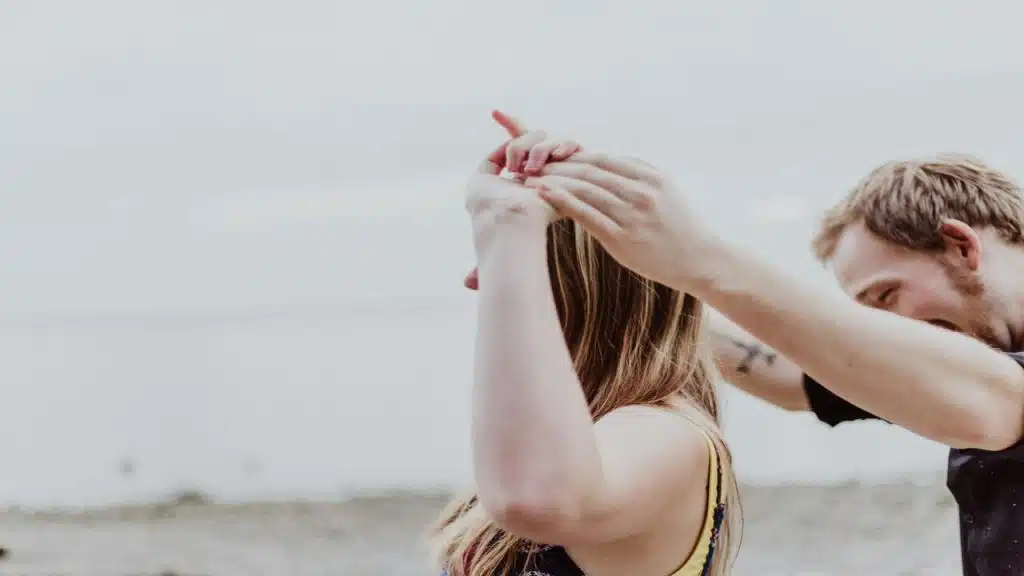 A couple walking on the beach