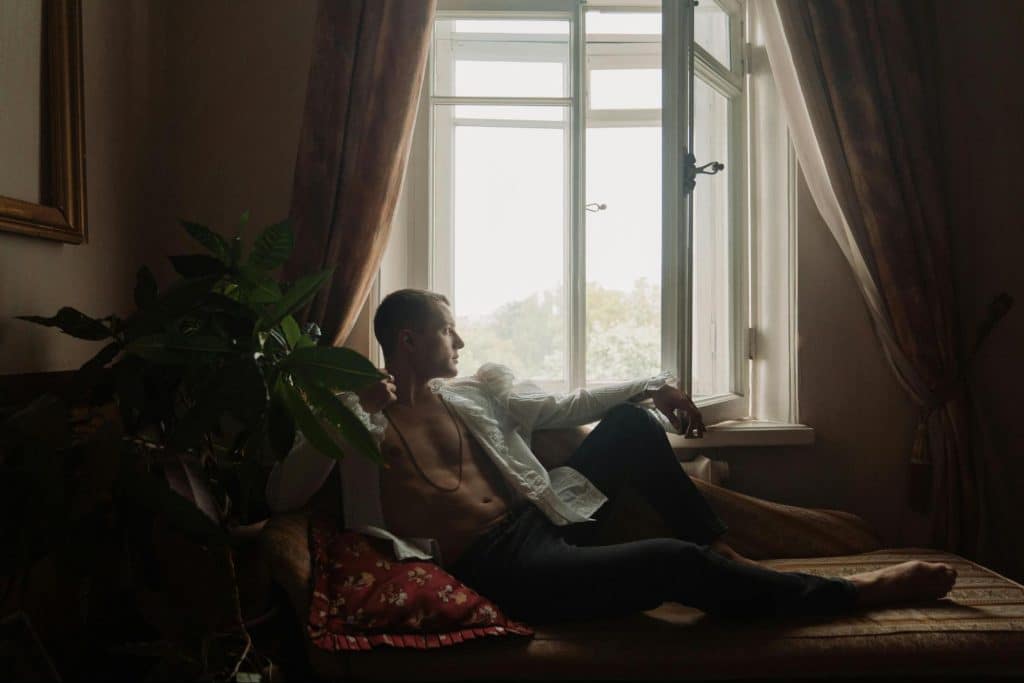 A man sitting at the window