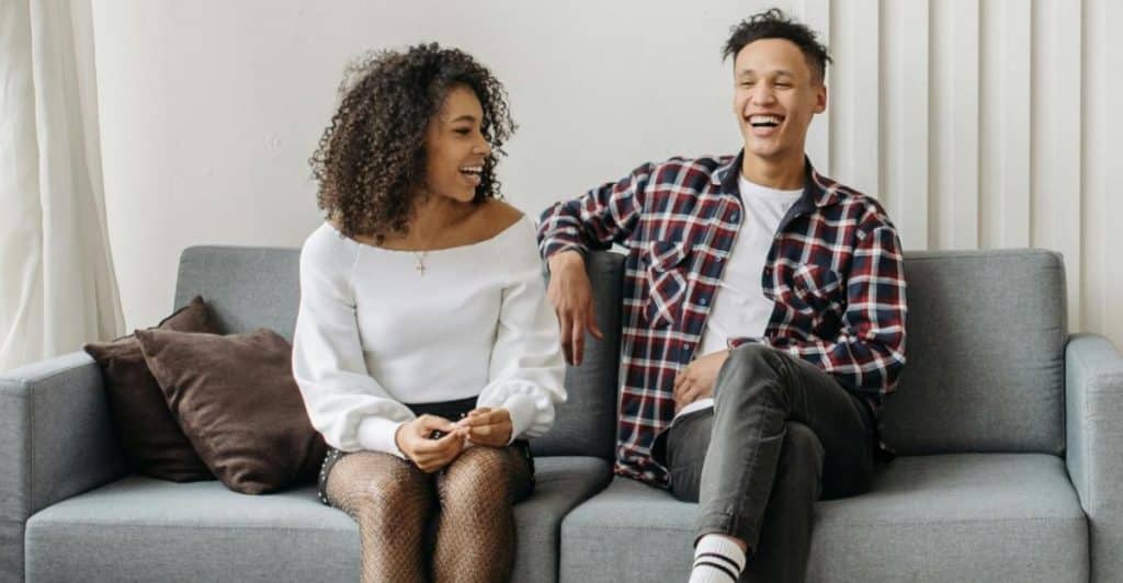 A man and woman talking 