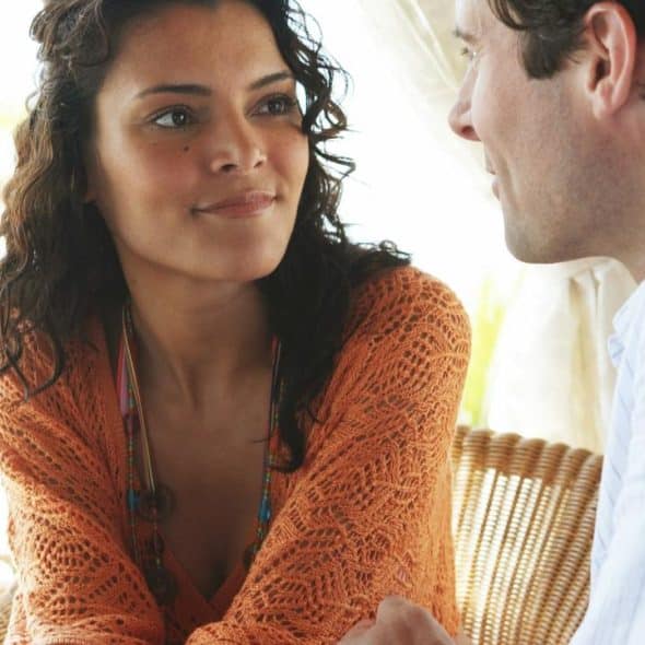 A woman and man sitting and talking