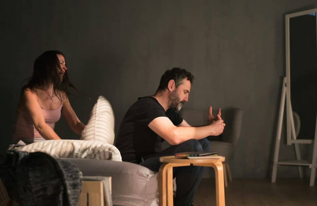 couple disagreement indoors
