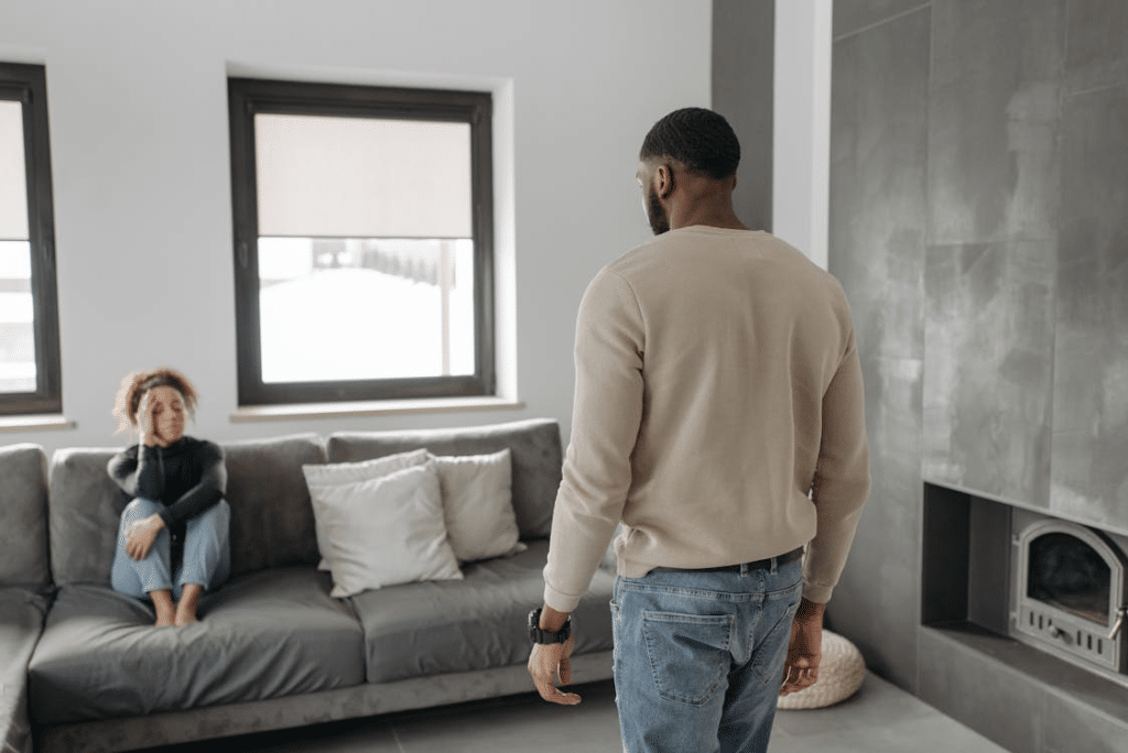 Unhappy couple in living room