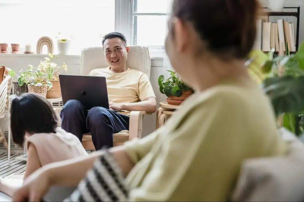 A man and woman smiling at each other