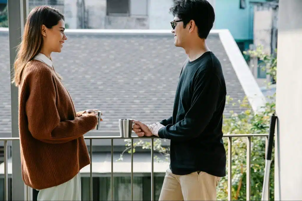 A man and woman talking
