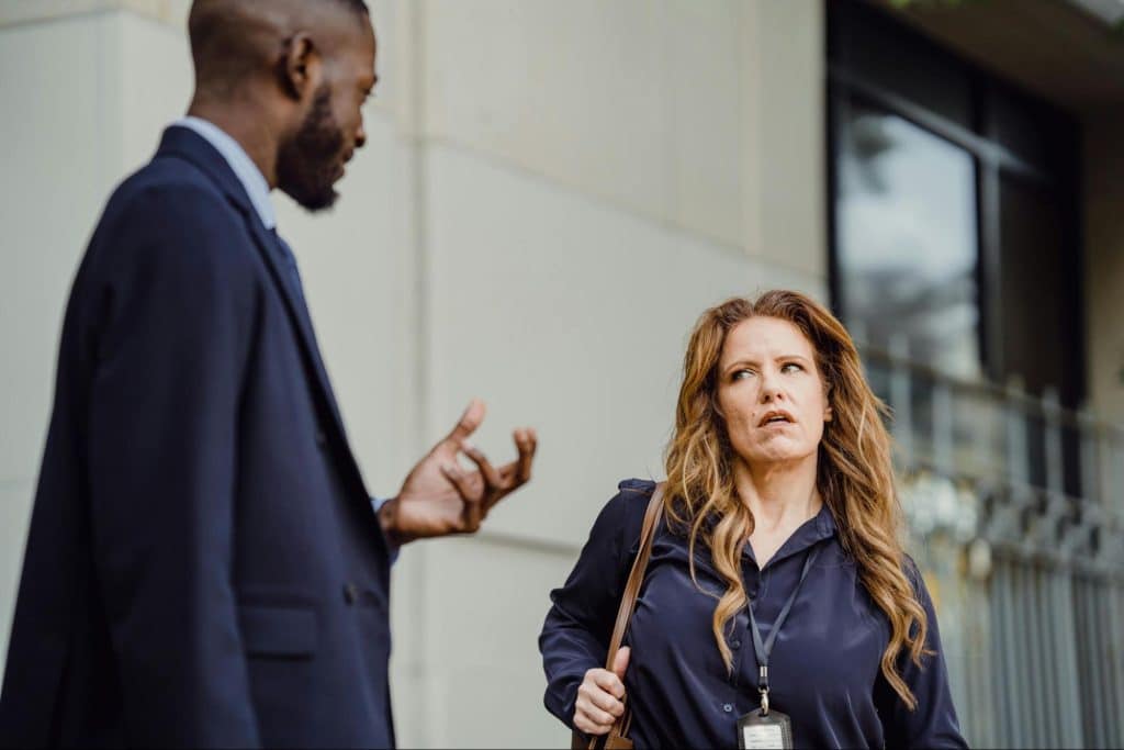 Woman looking annoyed with the man