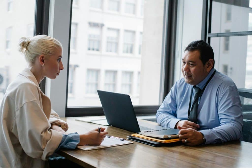 A man and woman talking
