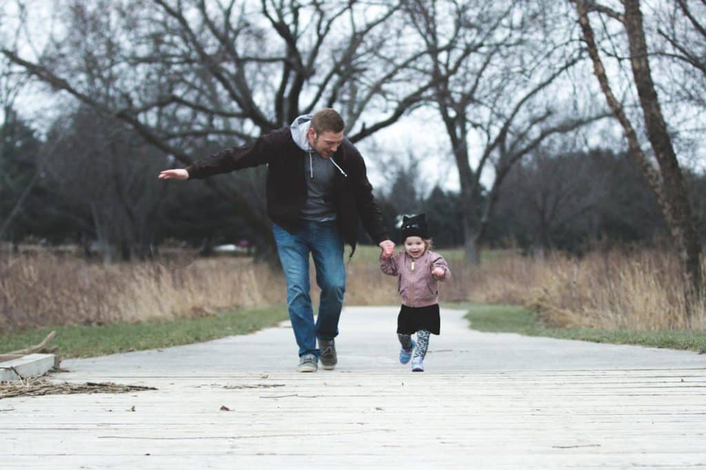 child with father outdoors