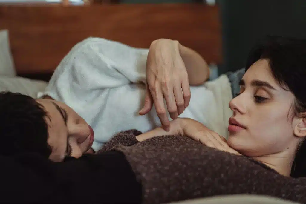 A man and woman looking at each other