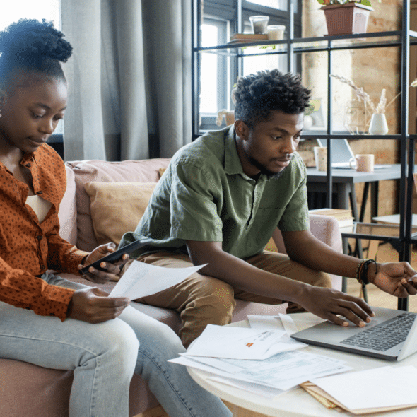 A couple working on their bills together