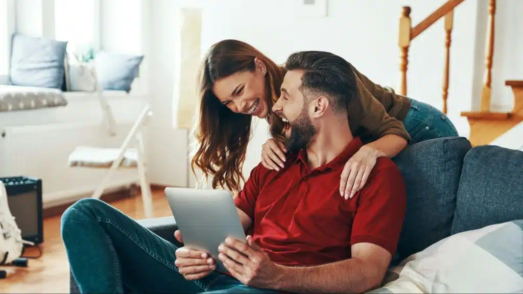 A woman checking in on a man