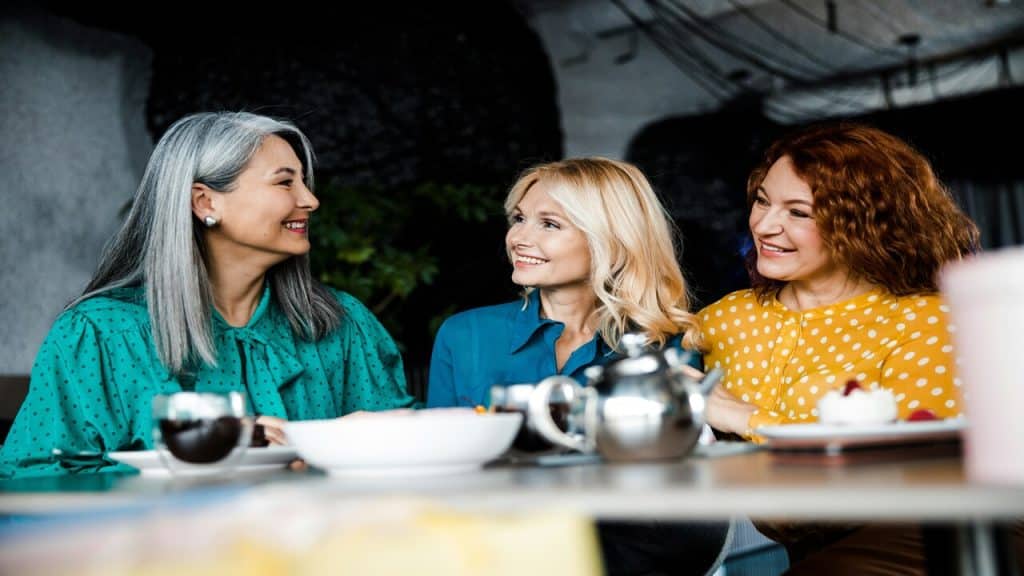 Female friends having lunch together