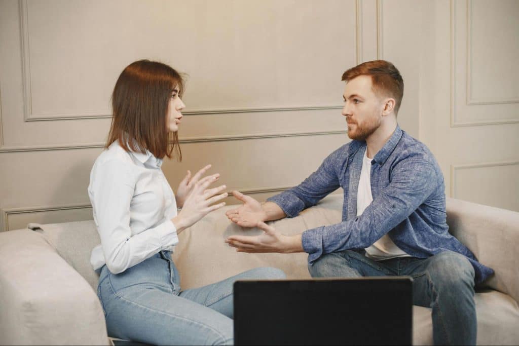 A man and woman talking