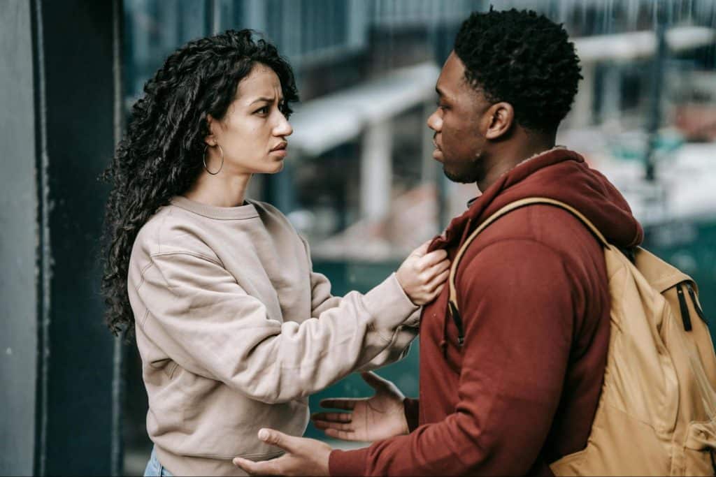 A man and woman talking