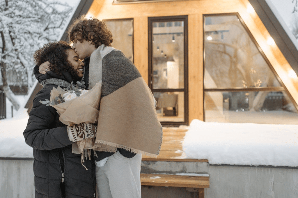 A man kissing a woman
