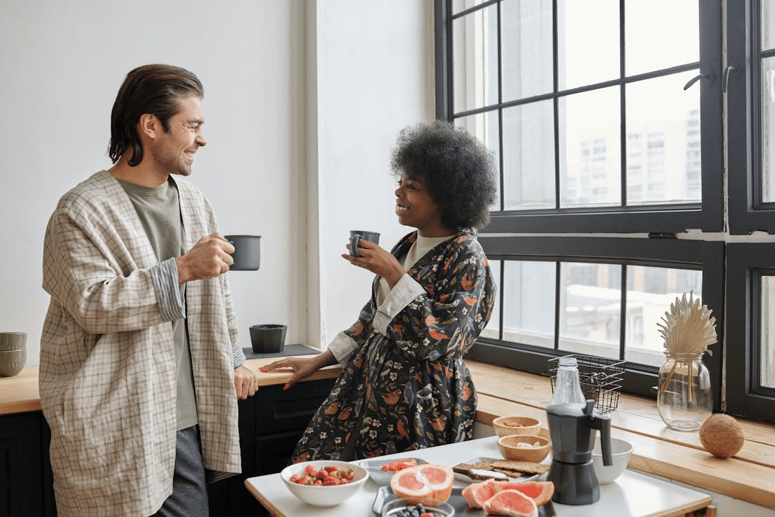A man and a woman smiling