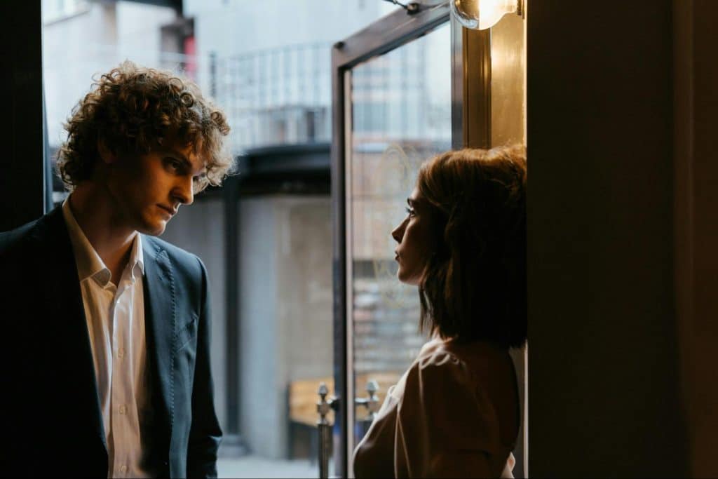 A man and woman looking at each other