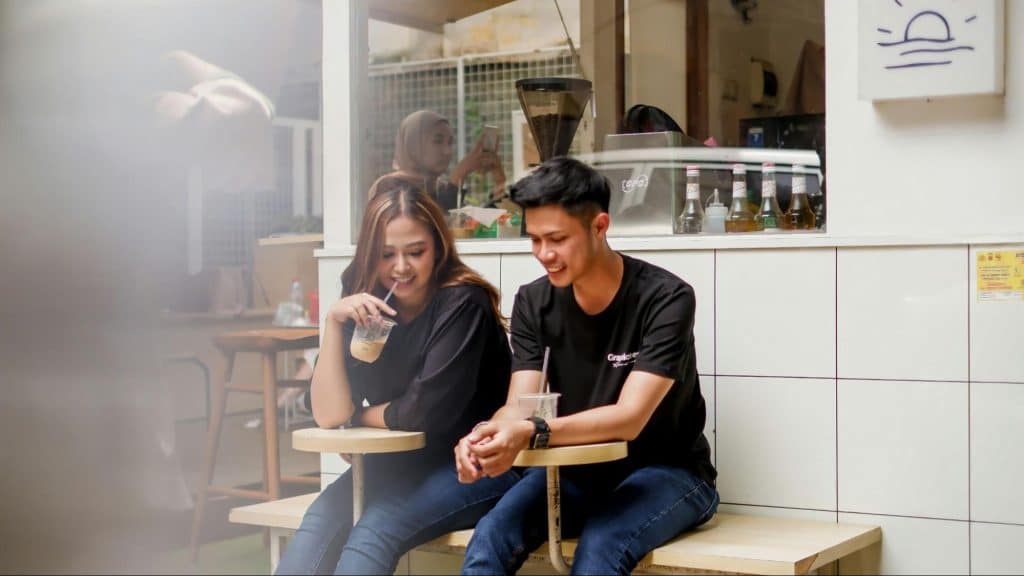 A man and woman at the cafe