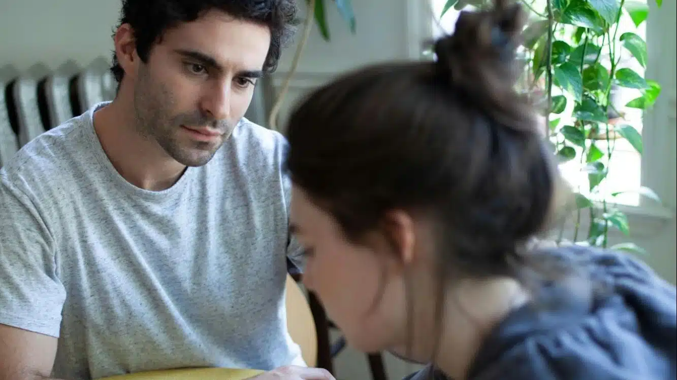 A man staring at the woman