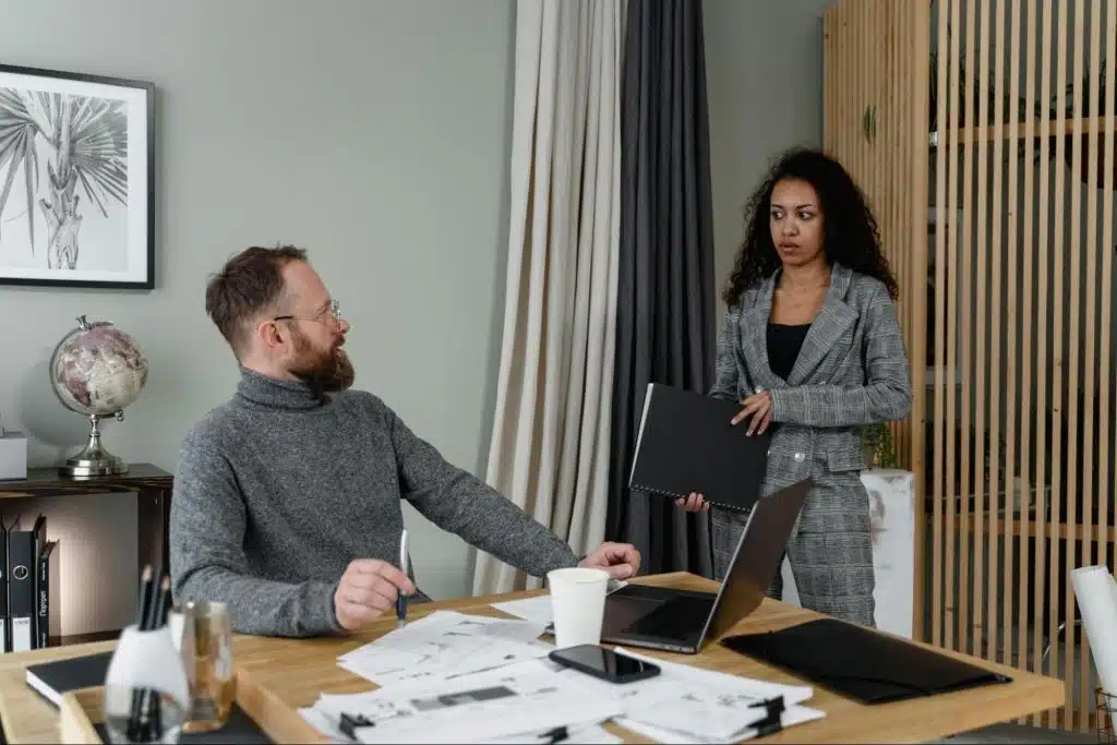 A man explaining to woman