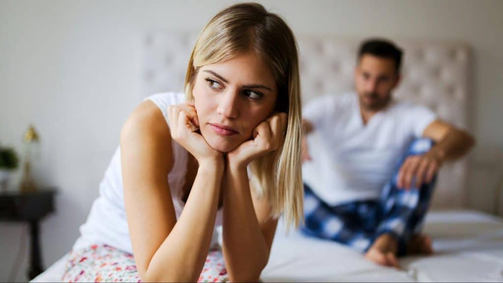 A woman not feeling good with her husband