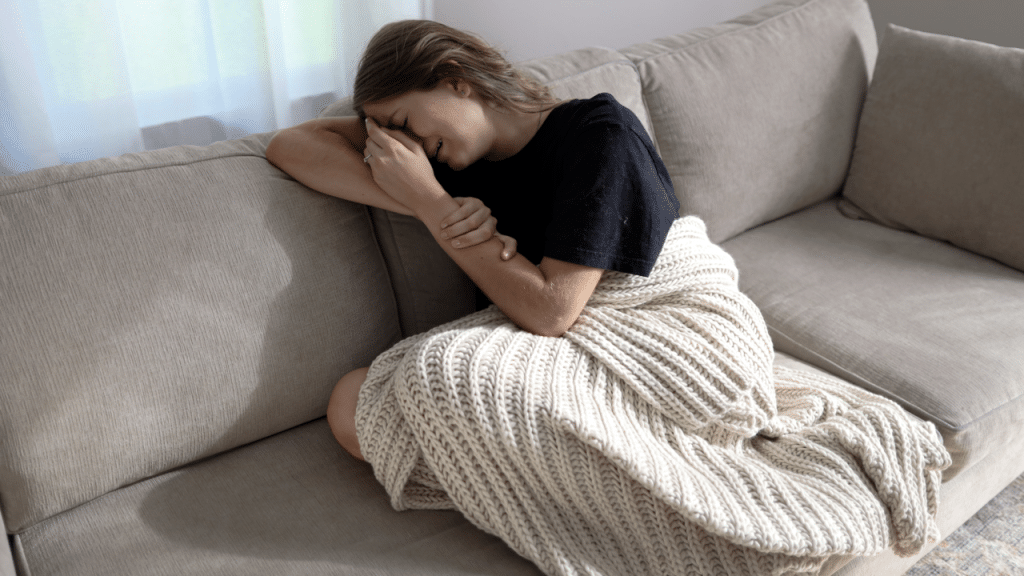 A woman crying in the living room
