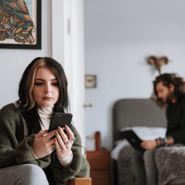 Avoidant couple ignoring each other