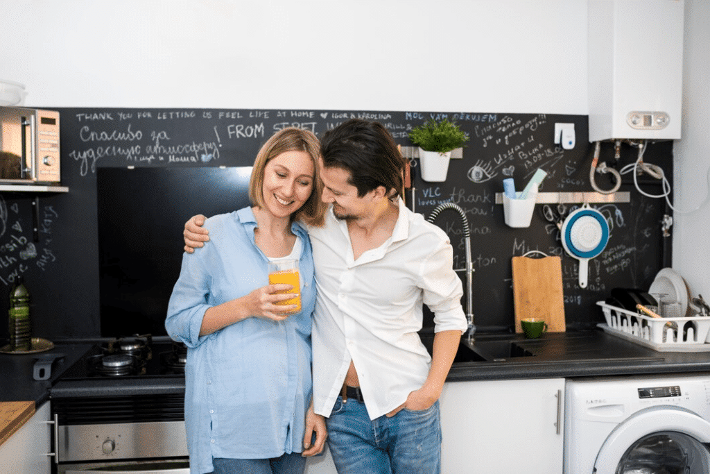Modern couple in kitchen